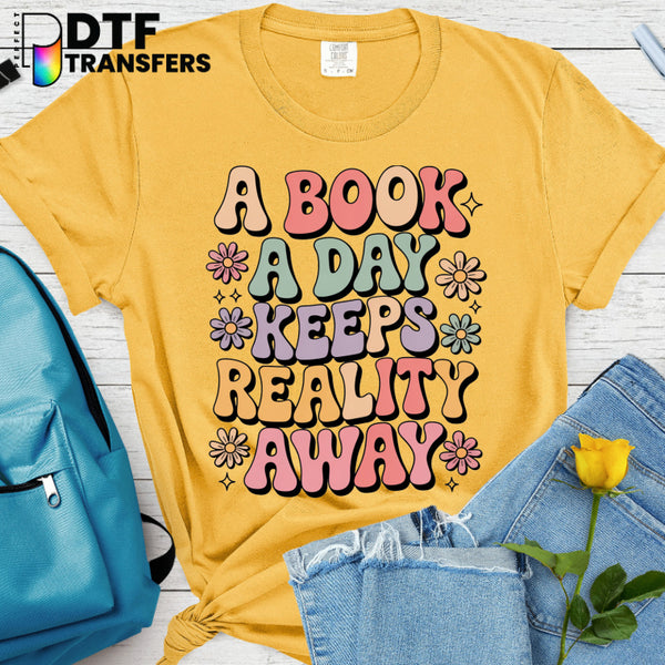 A Book A Day Keeps Reality Away – Teacher Reading DTF Transfer
