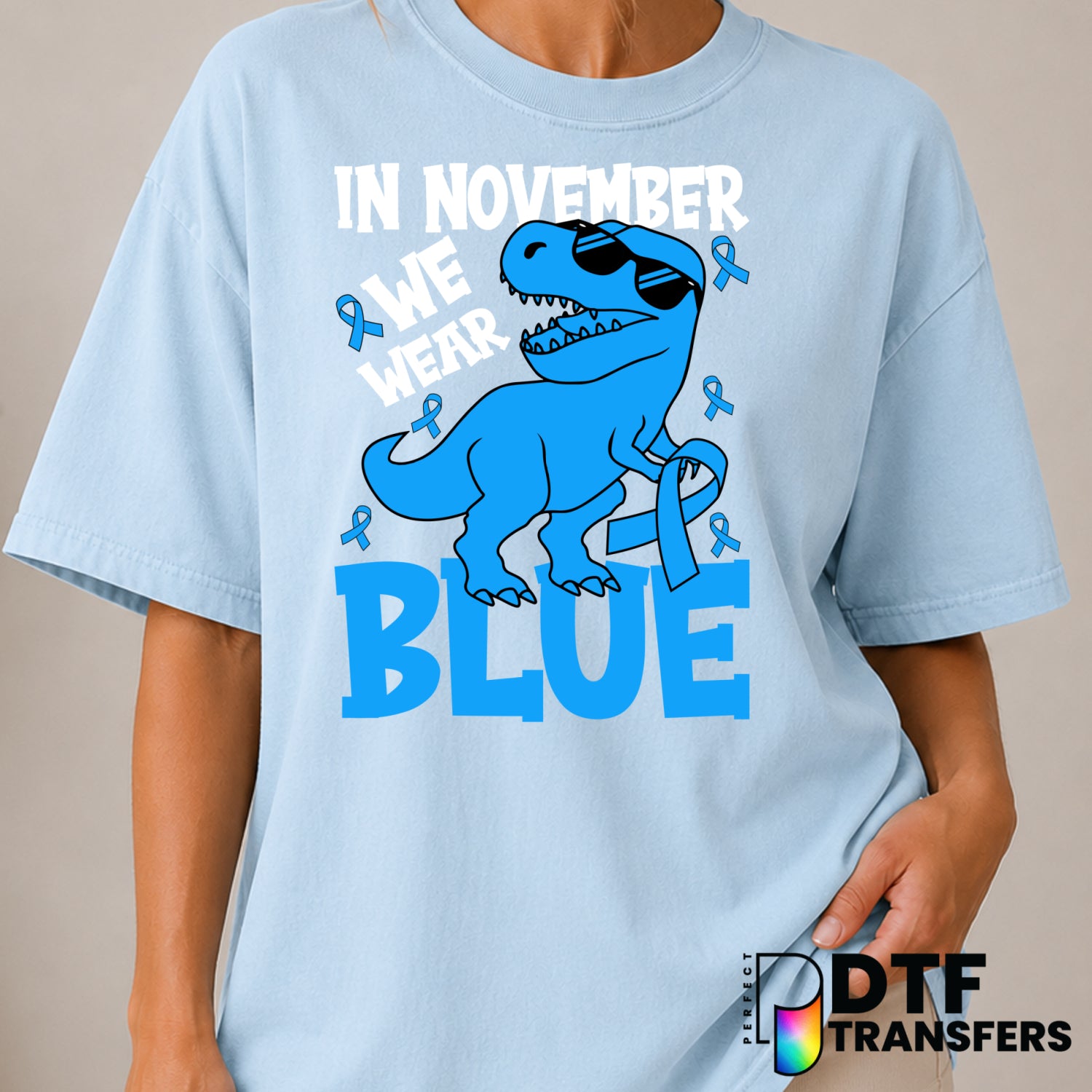In November We Wear Blue Dinosaurs – Diabetes Awareness DTF Transfer (view 1 of 2) – by Perfect DTF Transfers – Premade DT...